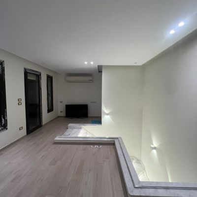 A spacious, fully equipped triplex apartment with a complete kitchen and air conditioning is available within the prestigious Sodic Eastown compound