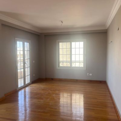 Unfurnished apartment with kitchen for rent in Al Narges Buildings, Fifth Settlement.