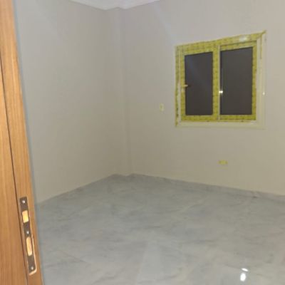 An empty apartment for rent with a kitchen in New Narges, Fifth Settlement, 