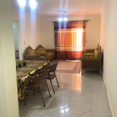 Furnished apartment for rent in Gardenia City Compound - Zone 4, Nasr City, close to the Ring Road and Al-Moshir Tantawi Axis, and next to services and malls.