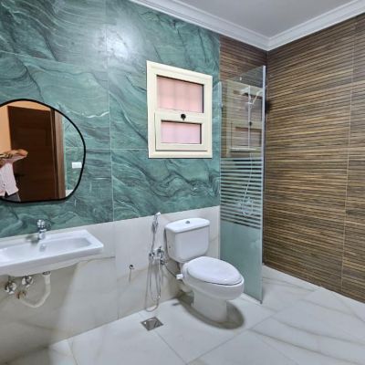 Unfurnished apartment for rent in front of the American University Housing Complex &ndash; Fifth Settlement: Unfurnished and ready-to-move-in apartment in a very prime location in front of the American University Housing Complex (AUC Housing) in the Fifth