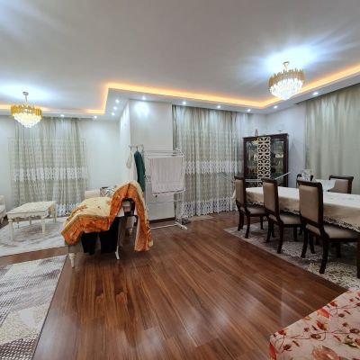 An empty apartment for rent with a kitchen in Al Qarnafel Villas Compound in the First Settlement, close to all basic services such as schools, nurseries, malls, restaurants and cafes, in addition to easy access to main roads and axes such as the Suez Roa